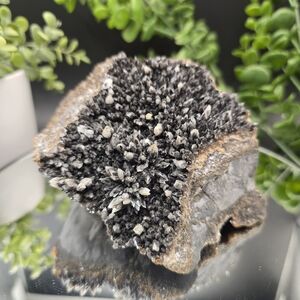 - Dogtooth calcite on Iridescent calcite Oskaloosa Iowa